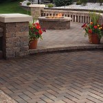 fire pit with holland paver decking and step